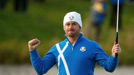 Dubuisson earns glowing praise from McDowell