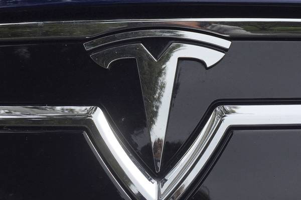 Tesla shares surge after car-maker delivers record number of vehicles