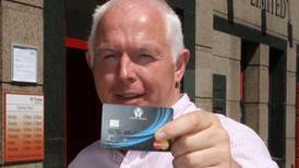 Central Bank threatens to delay credit union debit cards