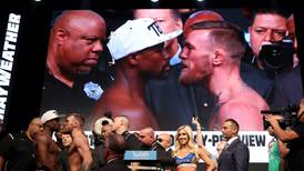 McGregor makes weight; Mayweather makes promise fight won’t go distance