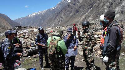 Rescuers search for hundreds of bodies buried in Nepal