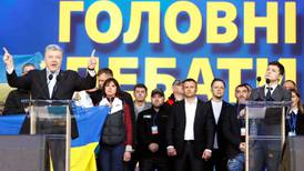 Ukraine's bruising presidential campaign ends with rowdy arena debate