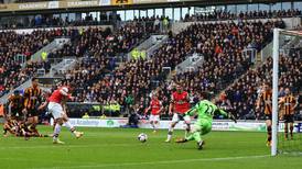Lukas Podolski strikes twice as Arsenal glide past Hull