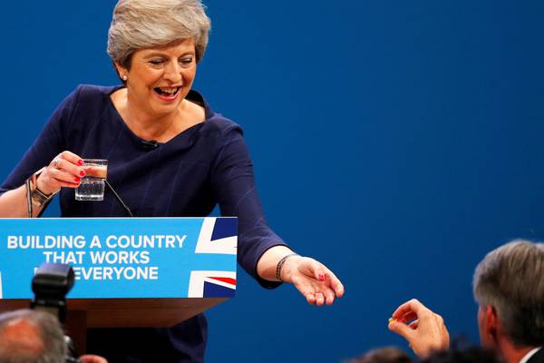 May’s speech at Tory conference interrupted by prankster