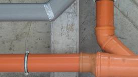 Property Clinic: How can I fix my pipe on adjoining boundary?