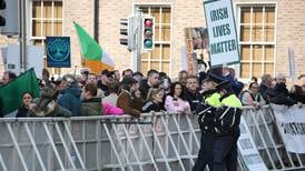 Thirteen arrests amid vitriolic protests outside Dáil as TDs safeguarded by gardaí