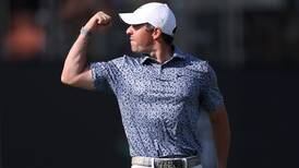 Rory McIlroy makes statement win in Dubai over rival Patrick Reed