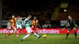 Leigh Griffiths sends Celtic 11 points clear with cool finish