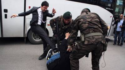 Turkish PM’s aide who kicked protester sacked, says official