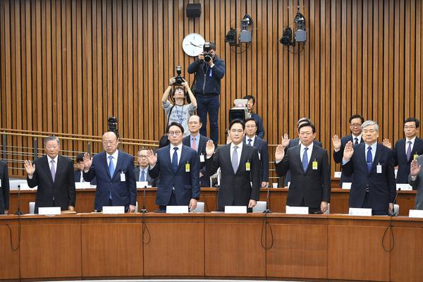 South Korea corporate chiefs deny seeking political favours