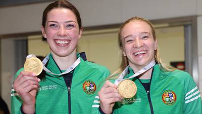 Hero’s welcome for boxers as they land back in Dublin after winning gold