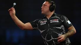 World Darts Championship: World number one Gerwyn Price exits in ear defenders
