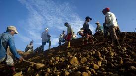 Almost 100 bodies pulled from Burma mine after landslide