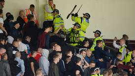 Burnley’s game with Hannover abandoned after crowd trouble