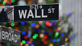 US stocks end tumultuous year at record high