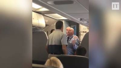 American Airlines worker suspended after row with passengers