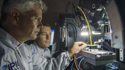 Many hands at new photonics platform to make light work better