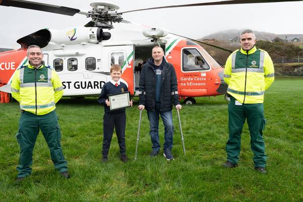 Boy (10) awarded certificate of bravery after father’s cliff fall