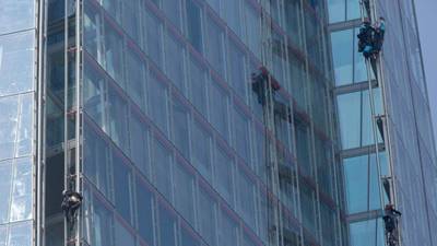 Six Greenpeace protesters arrested after scaling Britain’s tallest building