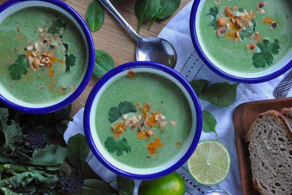 Green soup with harissa cream and hazelnuts