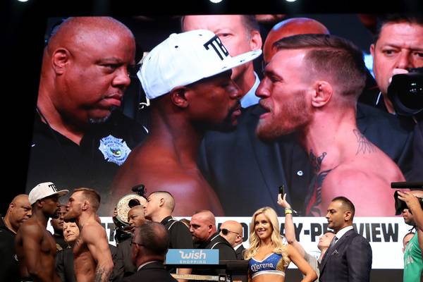 McGregor makes weight; Mayweather makes promise fight won’t go distance