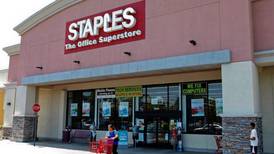 Staples cuts outlook after weak results abroad