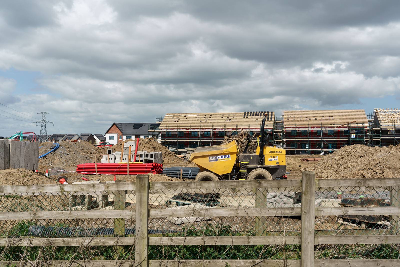 Builders working in Bay Meadows, a housing estate under construction, in west Dublin, Ireland, on Tuesday, May 11, 2021. The mass purchase of affordable houses  on the market for about 400,000 euros ($490,000)  set off a public firestorm and highlights the growing tension over the squeeze in urban housing and the role of large investors. Photographer: Paulo Nunes dos Santos/Bloomberg