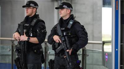 London Tube attack: Two men in custody as terror threat level is downgraded