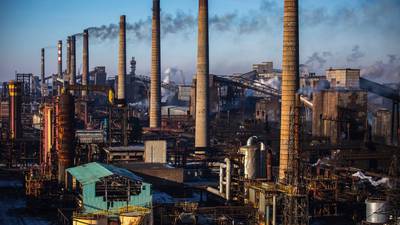 A factory in eastern Ukraine powers on as divisions deepen