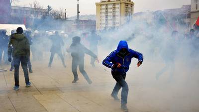Police and protesters fight running battles in Kosovo