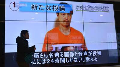 Mother of Japanese hostage begs prime minister for his life