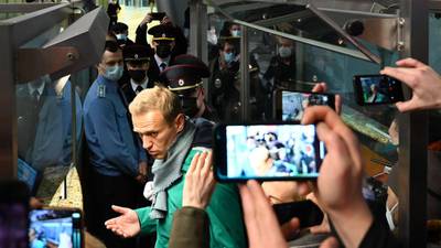 Kremlin critic Navalny detained on return to Moscow