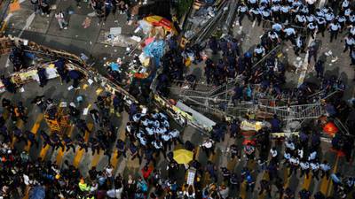 Hong Kong police clear activists from protest site