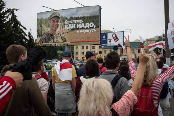 Tensions high in Belarus as troops gather at protester meeting site