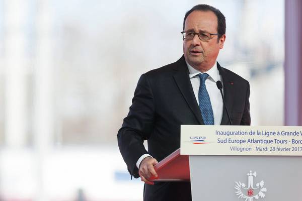 Police marksman accidentally injures two at Hollande speech