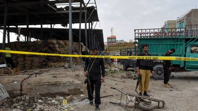 At least 18 killed in suicide bomb attack on market in Pakistan