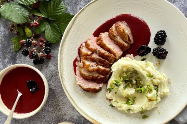 Duck with blackberry sauce and spring onion champ