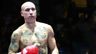 Boxer sparks row in Italy over neo-Nazi tattoos