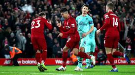 Liverpool storm past Arsenal to go nine points clear at the top