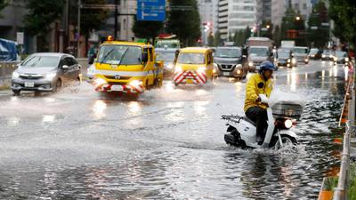 One killed, flights cancelled as typhoon hits Tokyo