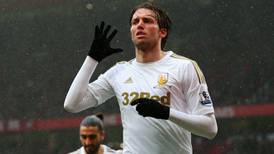 Former Swansea striker Michu forced to retire