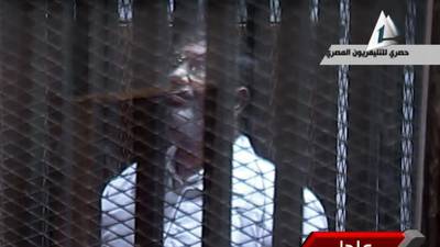 Morsi charged with jailbreak as violence continues in Cairo