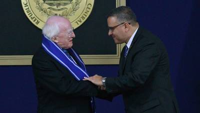 Higgins praises focus on remembering victims in El Salvador