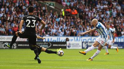 Aaron Mooy ensures Huddersfield keep up dream start