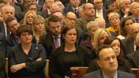 Political leaders awkwardly join standing ovation at Lyra McKee funeral