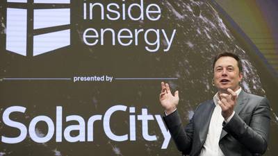 Musk sees $1 trillion Tesla as shares drop over SolarCity deal