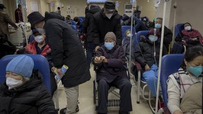 Patients left in hospital corridors as China reports more than 200,000 weekly Covid-19 cases -WHO