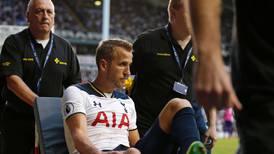 Harry Kane nets winner for Spurs but is stretchered off