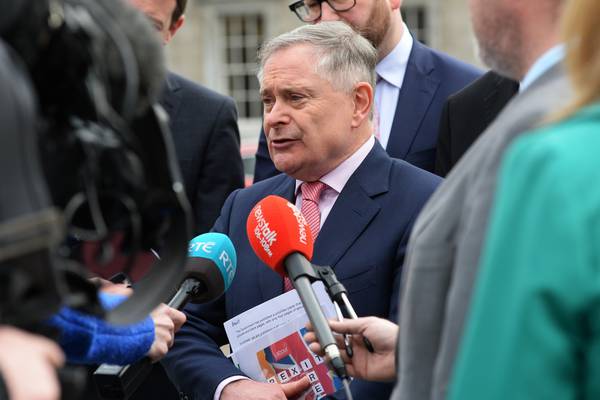 Delay water charge refunds to pay health overspend, Howlin says