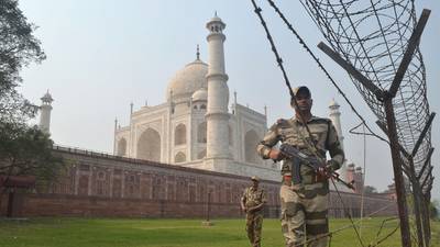 Men with catapults to protect Trumps from monkeys at Taj Mahal